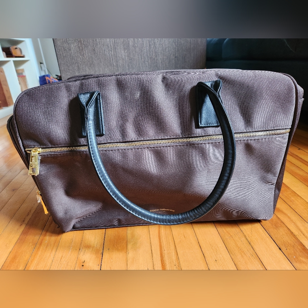 Paco Rabanne brown small duffel bag approx 8" x 18" x 11"